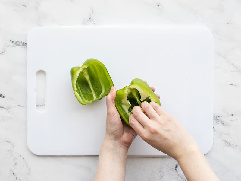 Seed pods being pulled out of the bell pepper