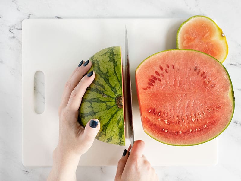 Cut watermelon in half