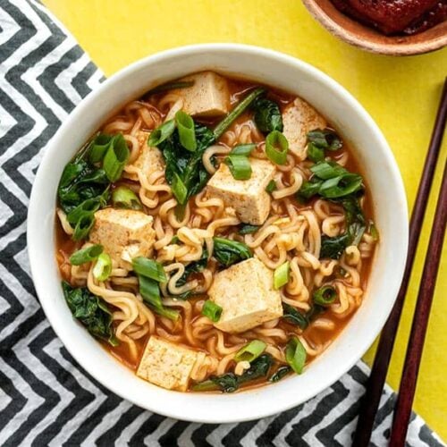 One bowl of gochujang ramen with tofu, chopsticks on the side