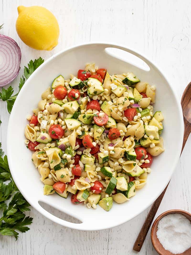 Overhead view of a serving bowl full of Summer Sweet Corn Salad