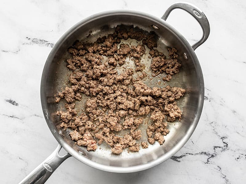 browned ground beef in a skillet