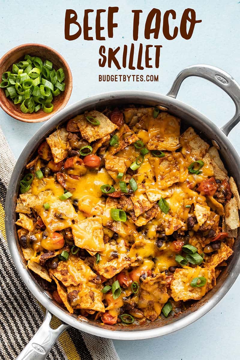 Overhead view of the finished beef taco skillet with title text at the top