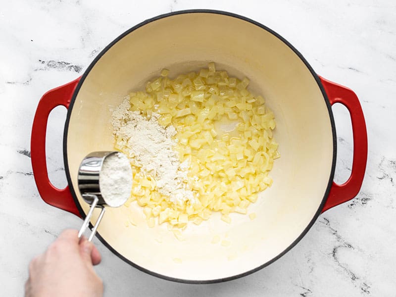 Sautéed onion and butter, flour being added to the pot