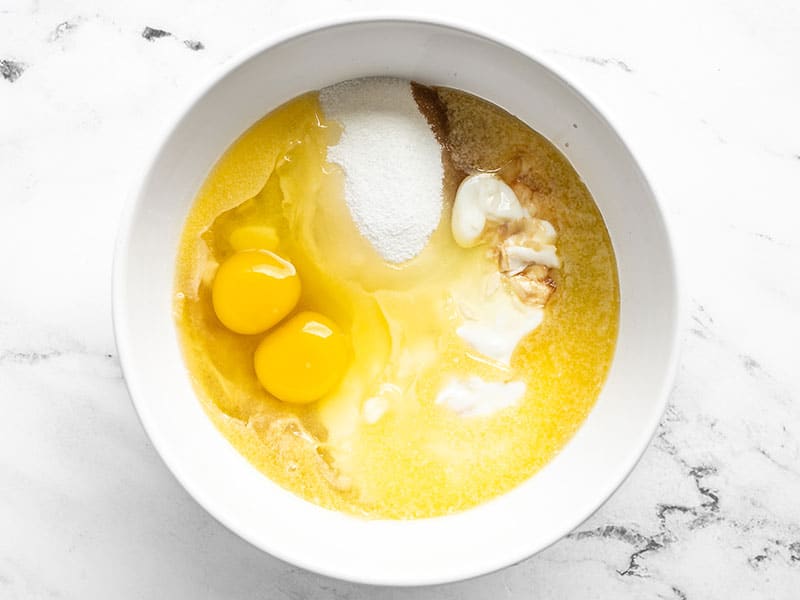 Wet ingredients for the banana muffins in a bowl