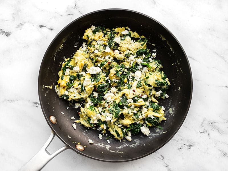 Finished eggs with feta and pepper