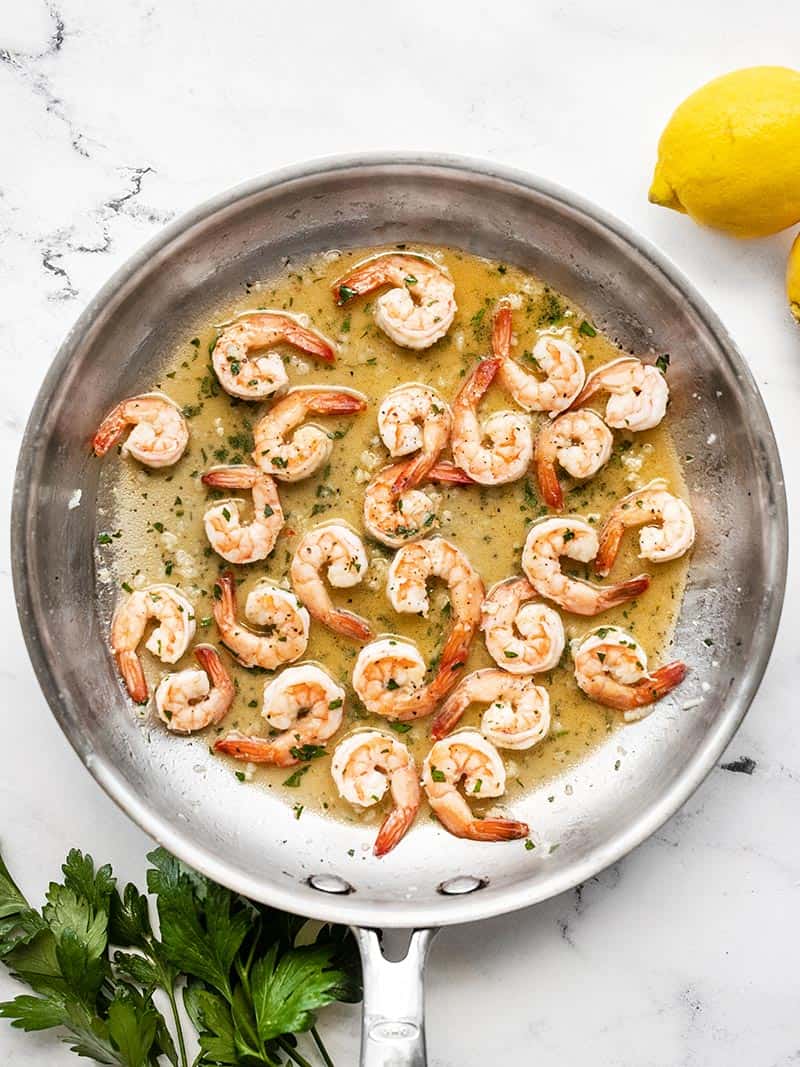 Overhead view of a skillet full of Garlic Butter Shrimp