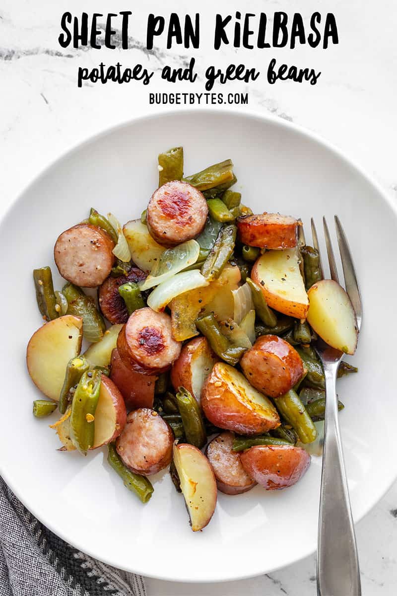 roasted kielbasa potatoes and green beans in a bowl