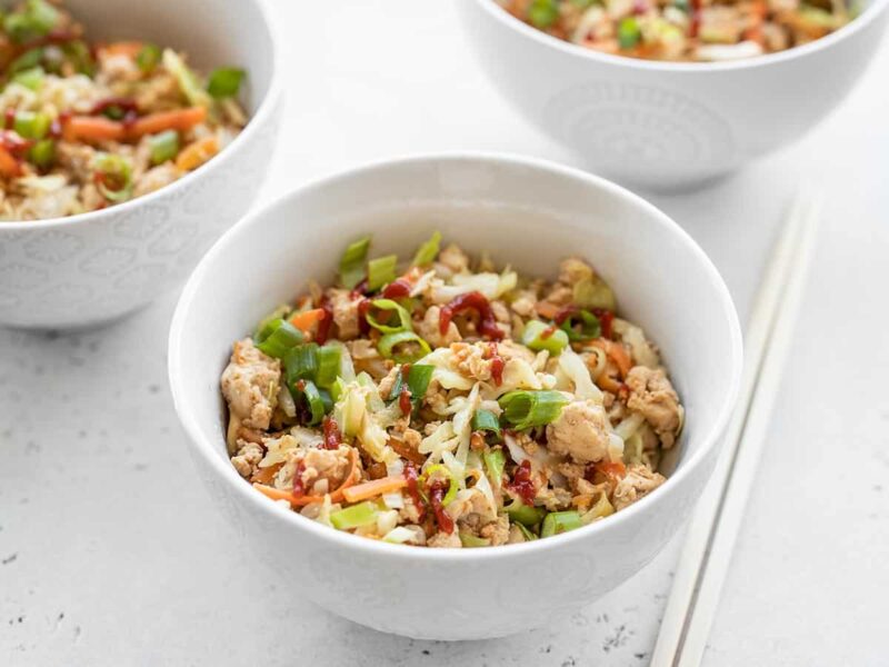 front view of three bowls full of quick tofu stir fry