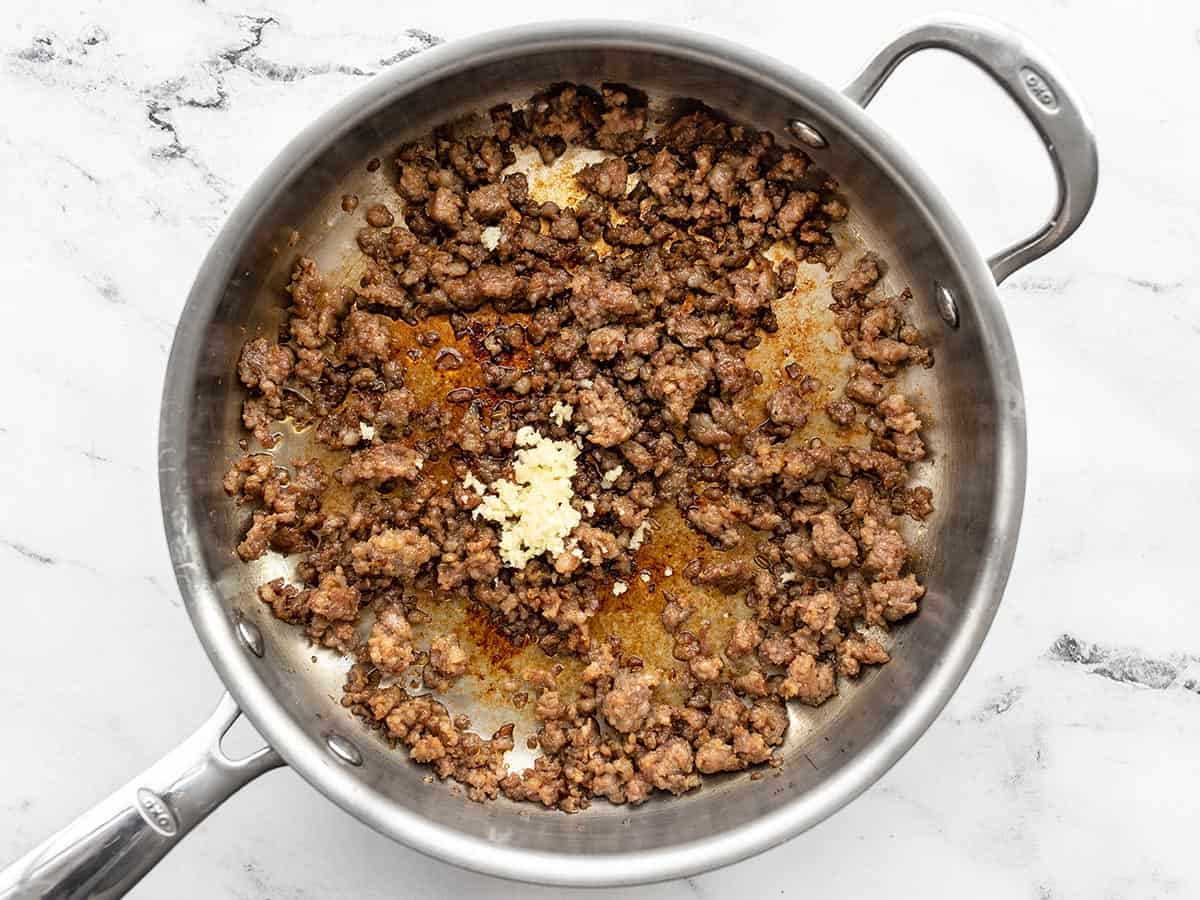 Browned sausage and garlic in the skillet