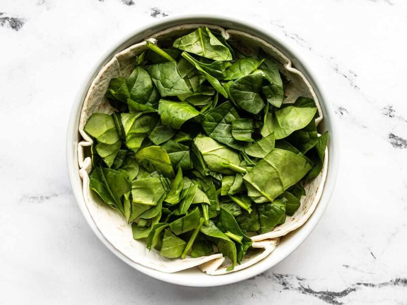 chopped spinach placed inside the tortilla