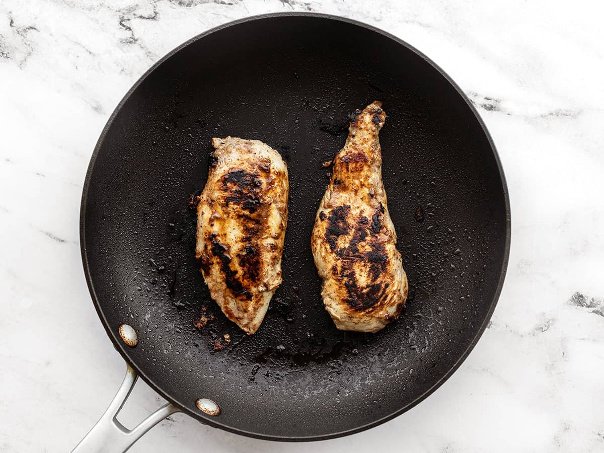 Cooked yogurt marinated chicken in the skillet