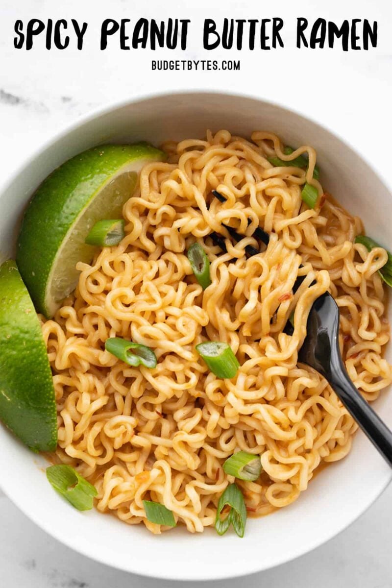 Overhead view of spicy peanut butter ramen with title text at the top