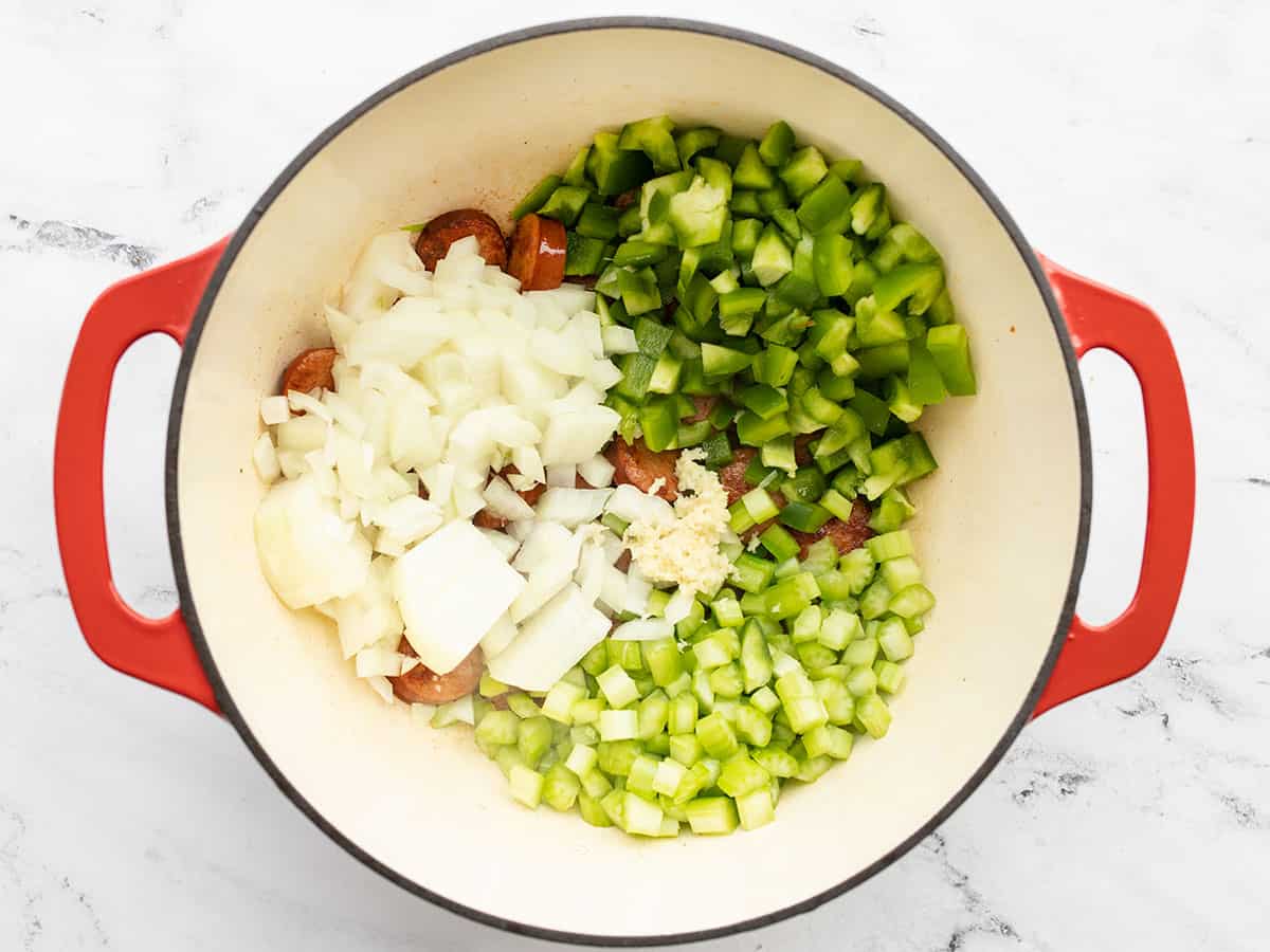 Onion, celery, bell pepper, and garlic added to the pot