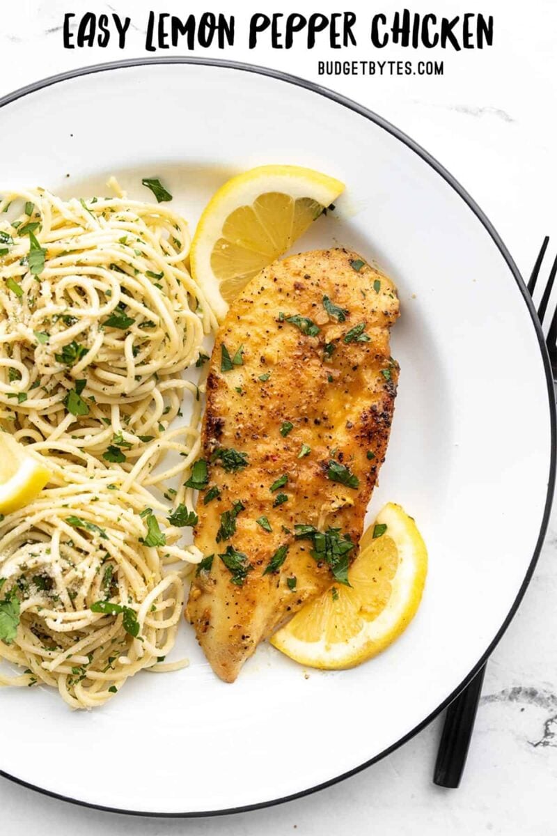 Lemon pepper chicken on a plate with pasta