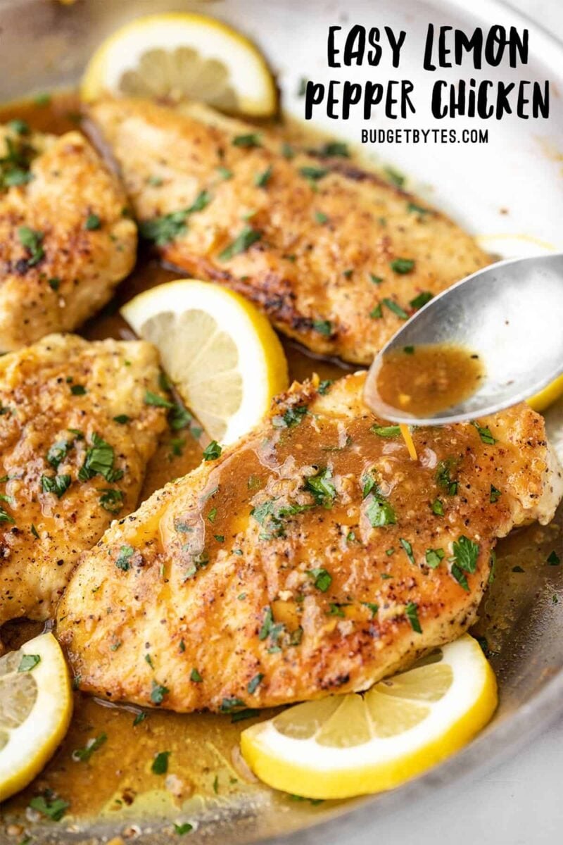 Pan sauce being drizzled over lemon pepper chicken, title text at the top