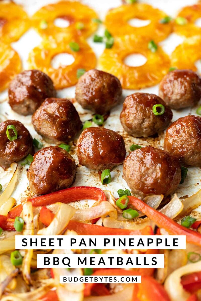 Front view of bbq meatballs, peppers, onions, and pineapple on a sheet pan. Title text at the bottom