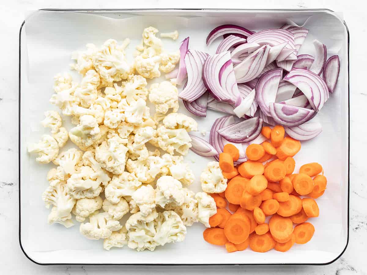 Chopped vegetables on a baking sheet