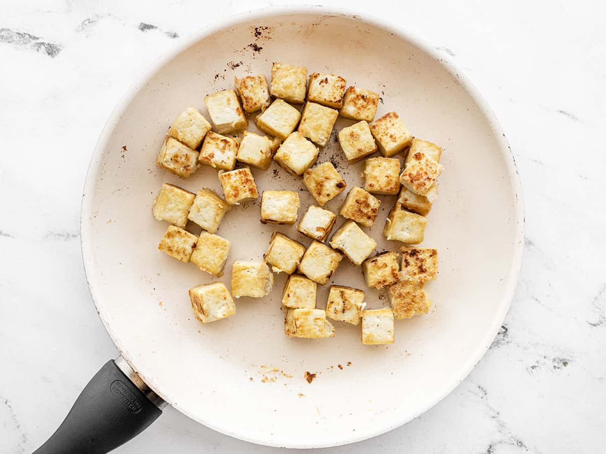 Crispy tofu in a skillet