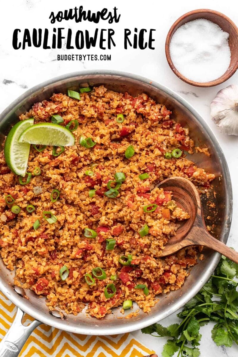 Overhead view of southwest cauliflower rice in a skillet, title text at the top