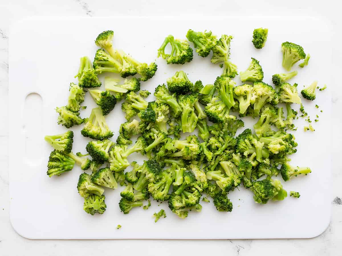 Chopped broccoli on a cutting board