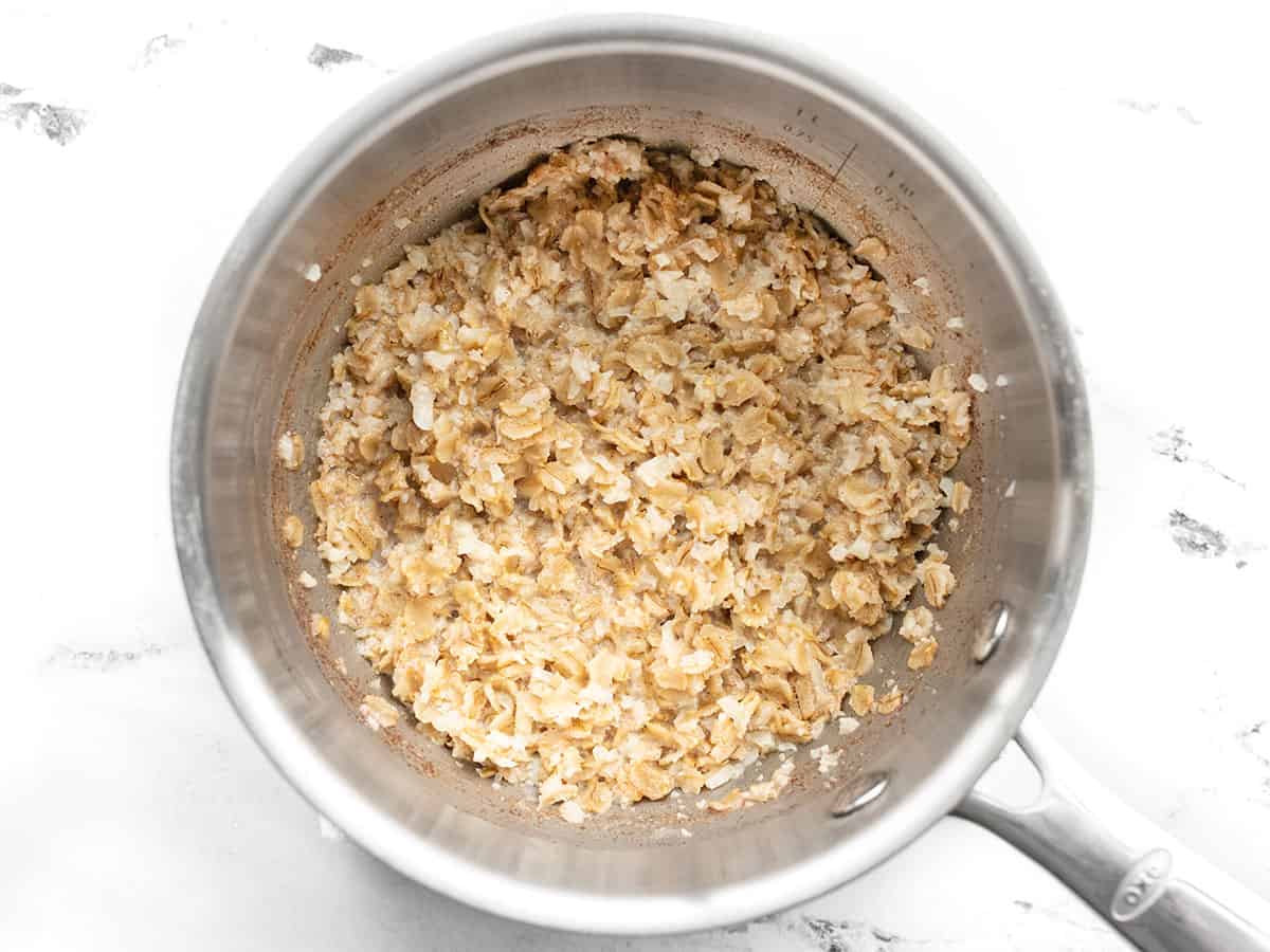 Finished oats cooked in a saucepot on the stove top