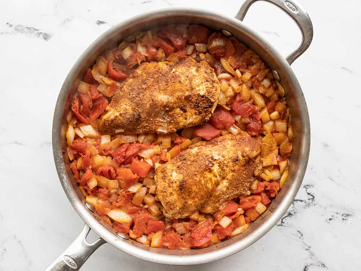 Cooked chicken and rice in the skillet