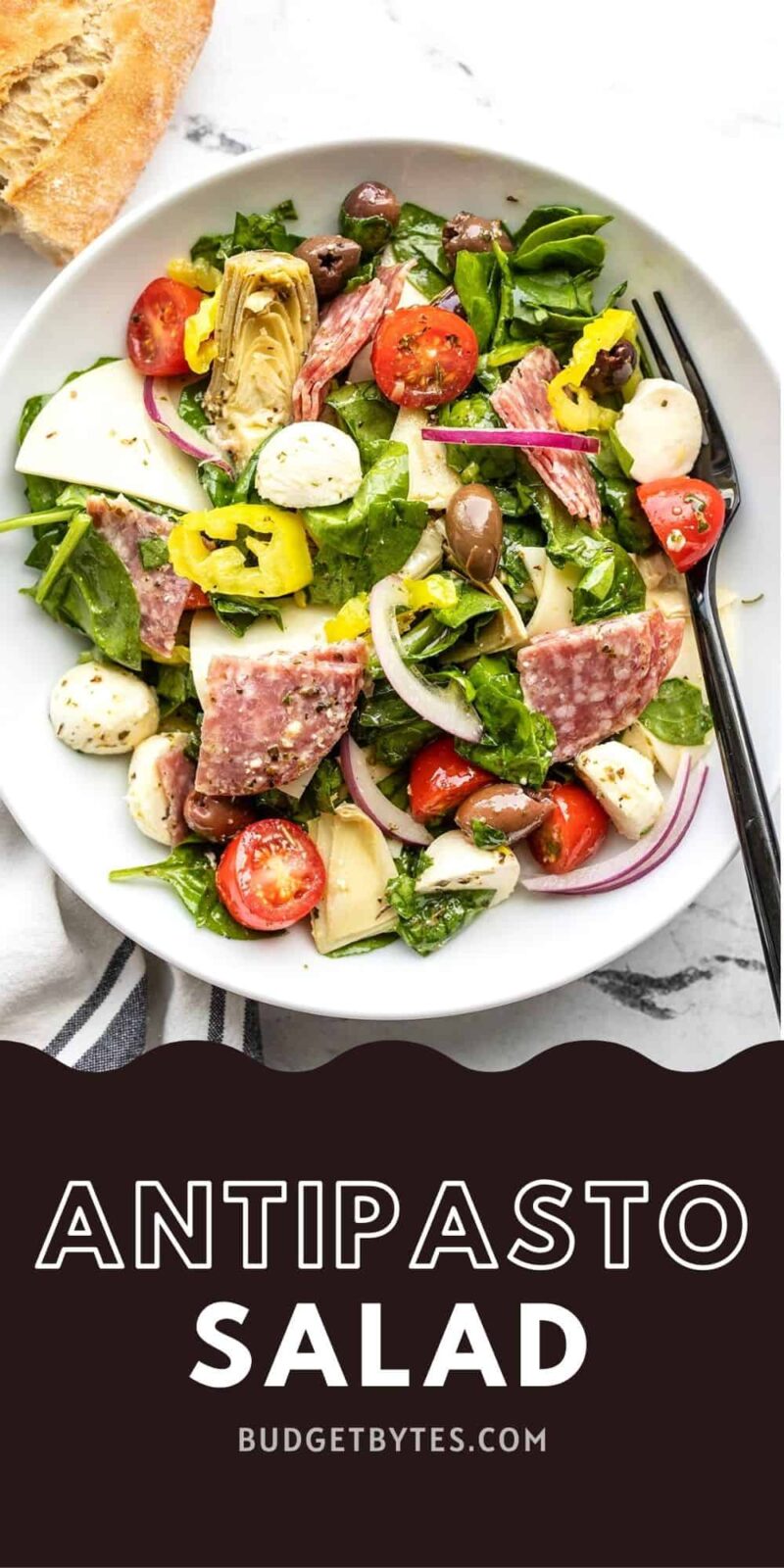 Antipasto salad in a bowl, title text at the bottom