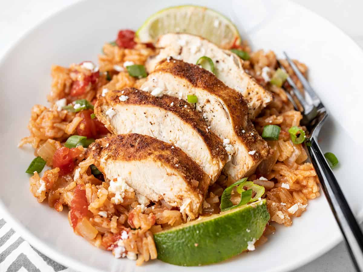 Side view of chipotle lime chicken and rice in a bowl