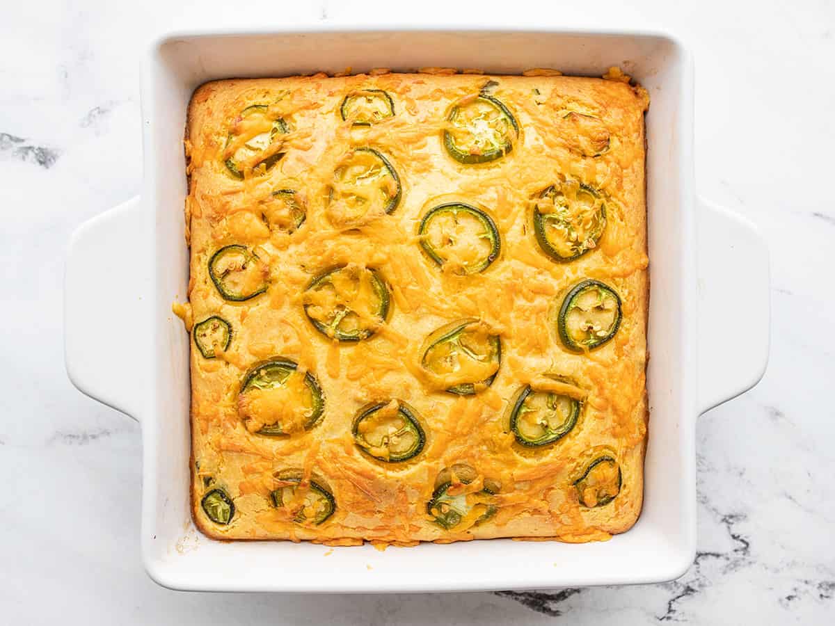 baked jalapeño cheddar cornbread in the baking dish