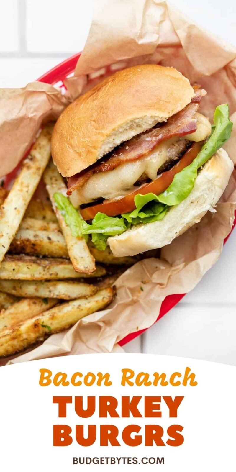 A bacon ranch turkey burger in a basket with fries, title text at the bottom