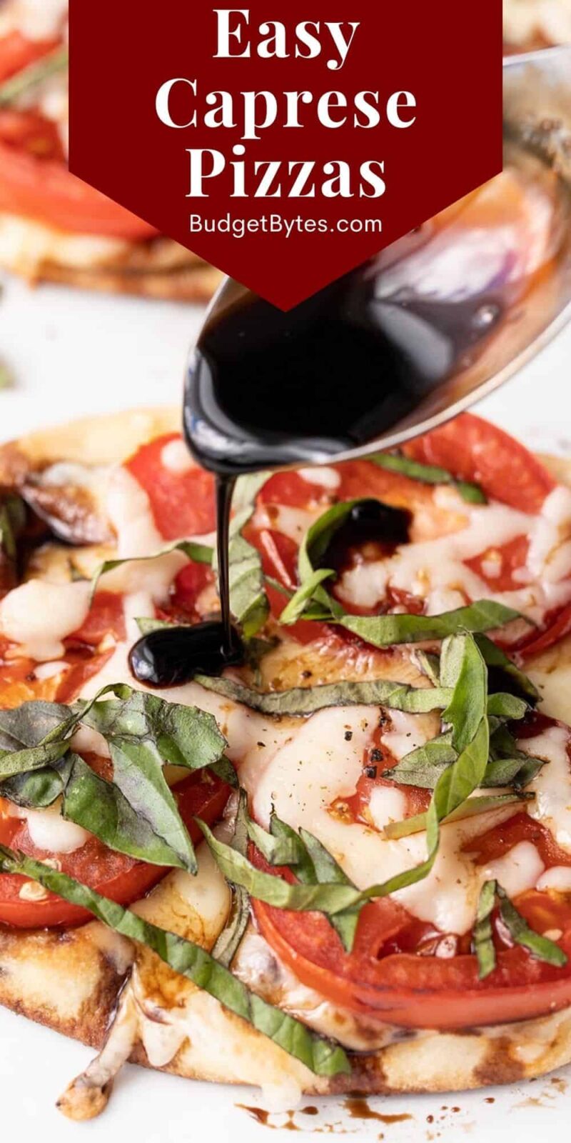 balsamic reduction being drizzled on top of a caprese pizza