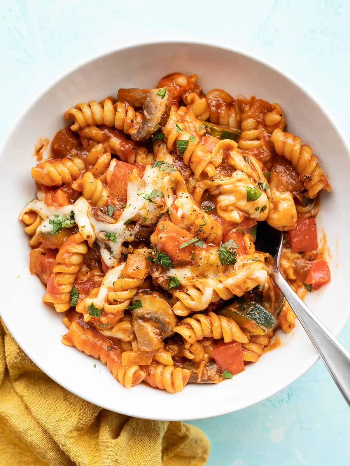 Overhead view of one pot veggie pasta in a bowl