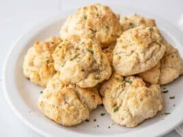 side view of ranch drop biscuits on a plate