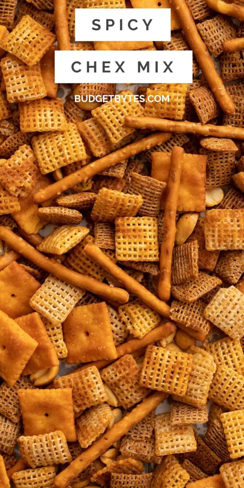 close up of spicy chex mix with title text at the top