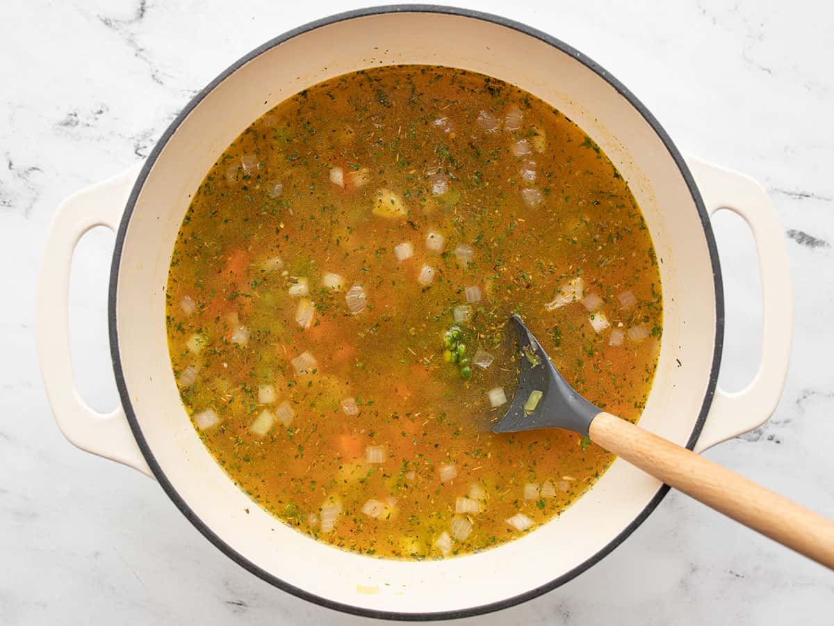 stirred soup ingredients in the pot