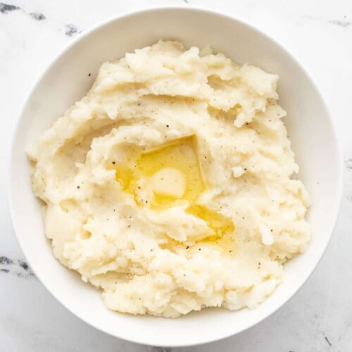 A plate of creamy mashed potatoes.