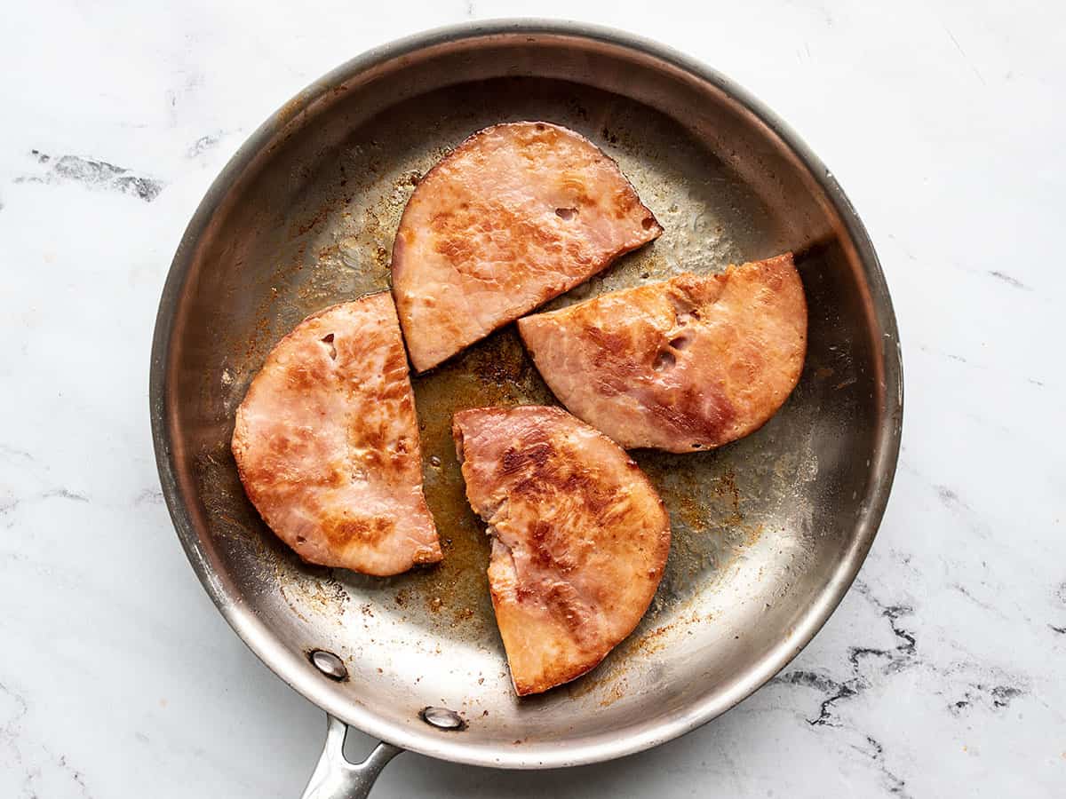 Browned ham steaks in the skillet