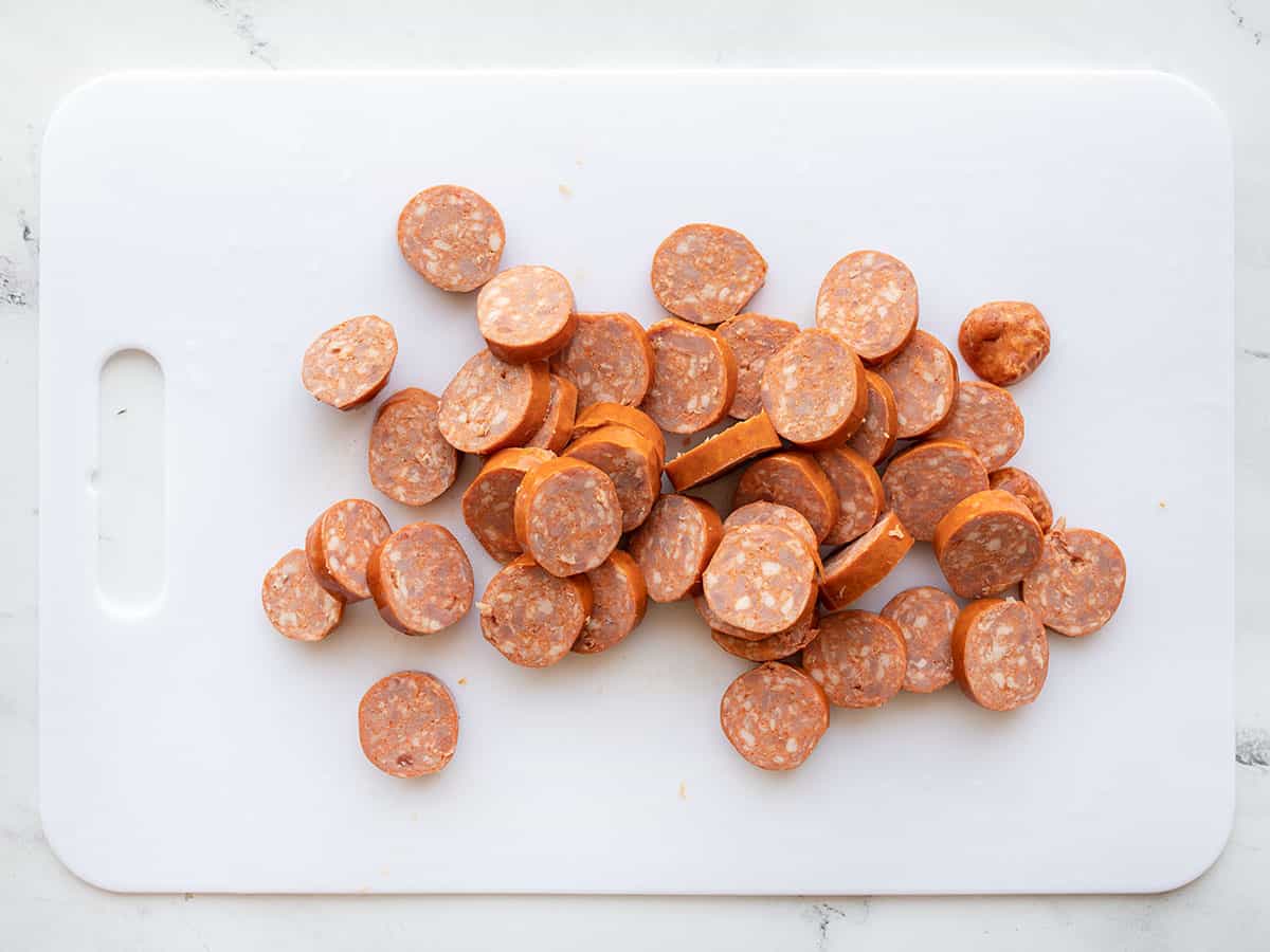 sliced sausage on a cutting board