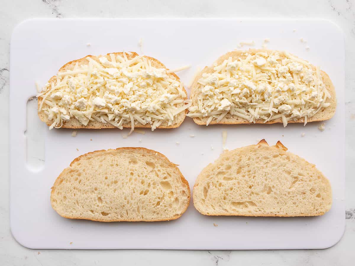 shredded mozzarella added to the bread