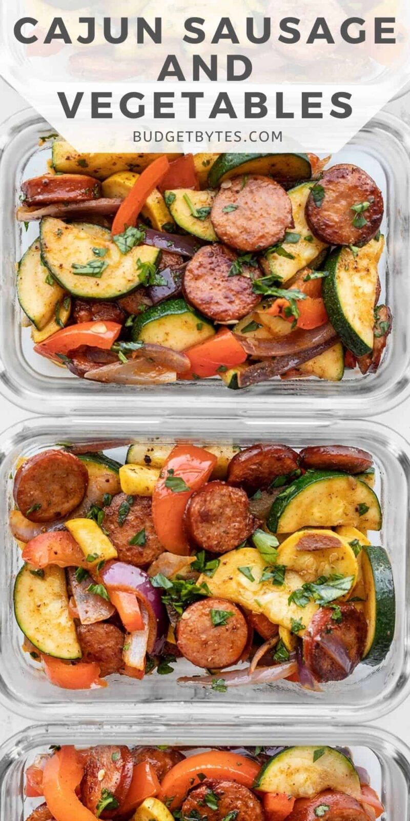 close up of cajun sausage and vegetables in meal prep containers