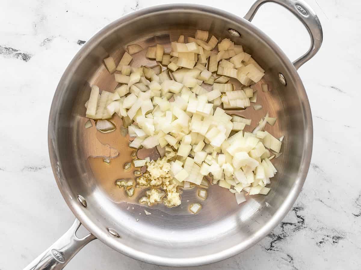 Diced onion and minced garlic in a skillet