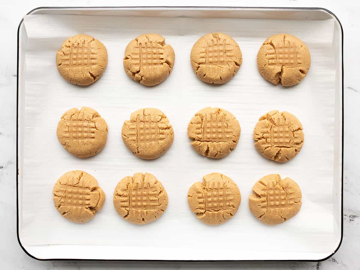 Baked peanut butter cookies on the baking sheet