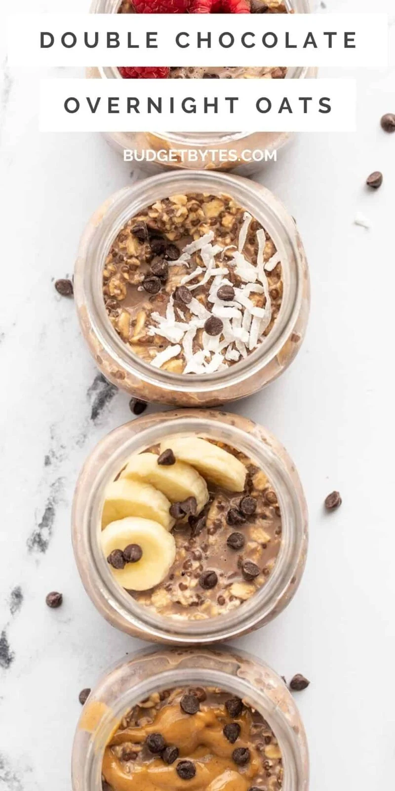 overhead view of four jars of overnight oats with different toppings