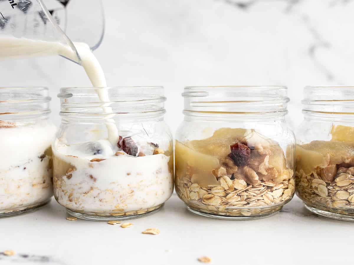 milk being poured into the jar.