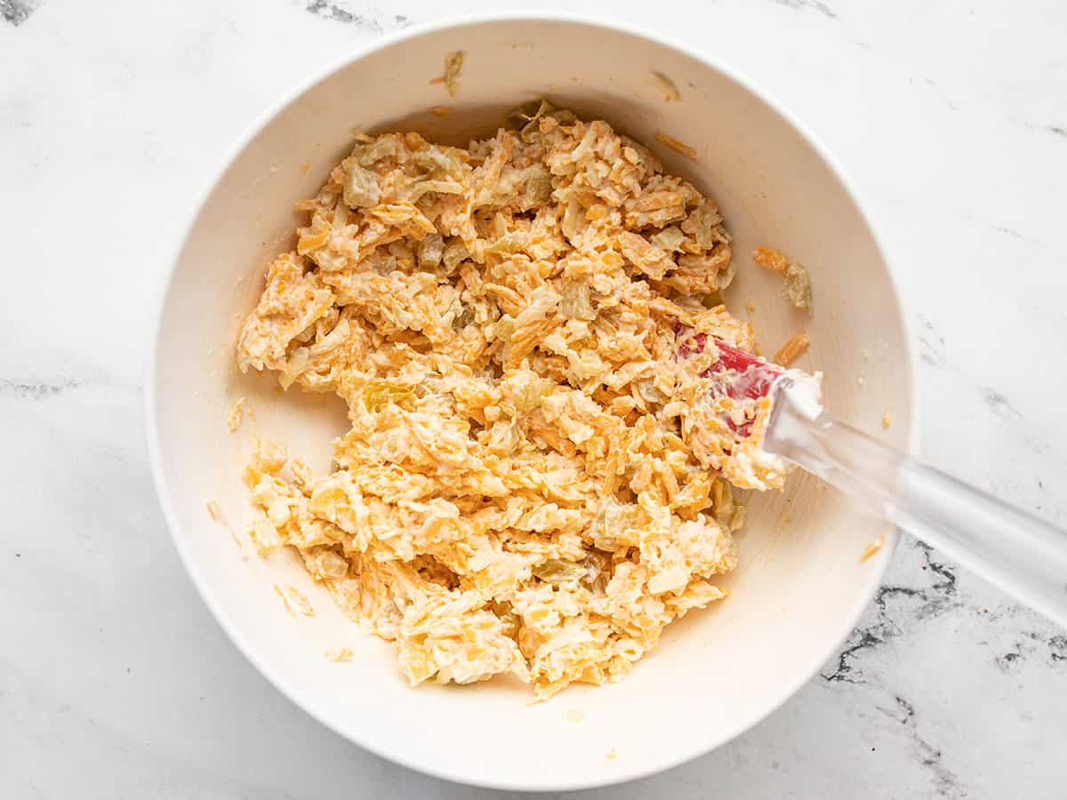 Cheese filling stirred together in the bowl.