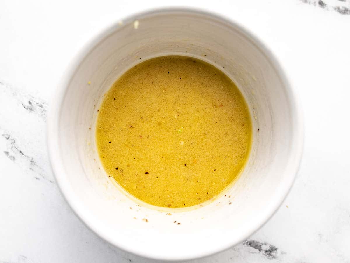 Lemon vinaigrette in a bowl.