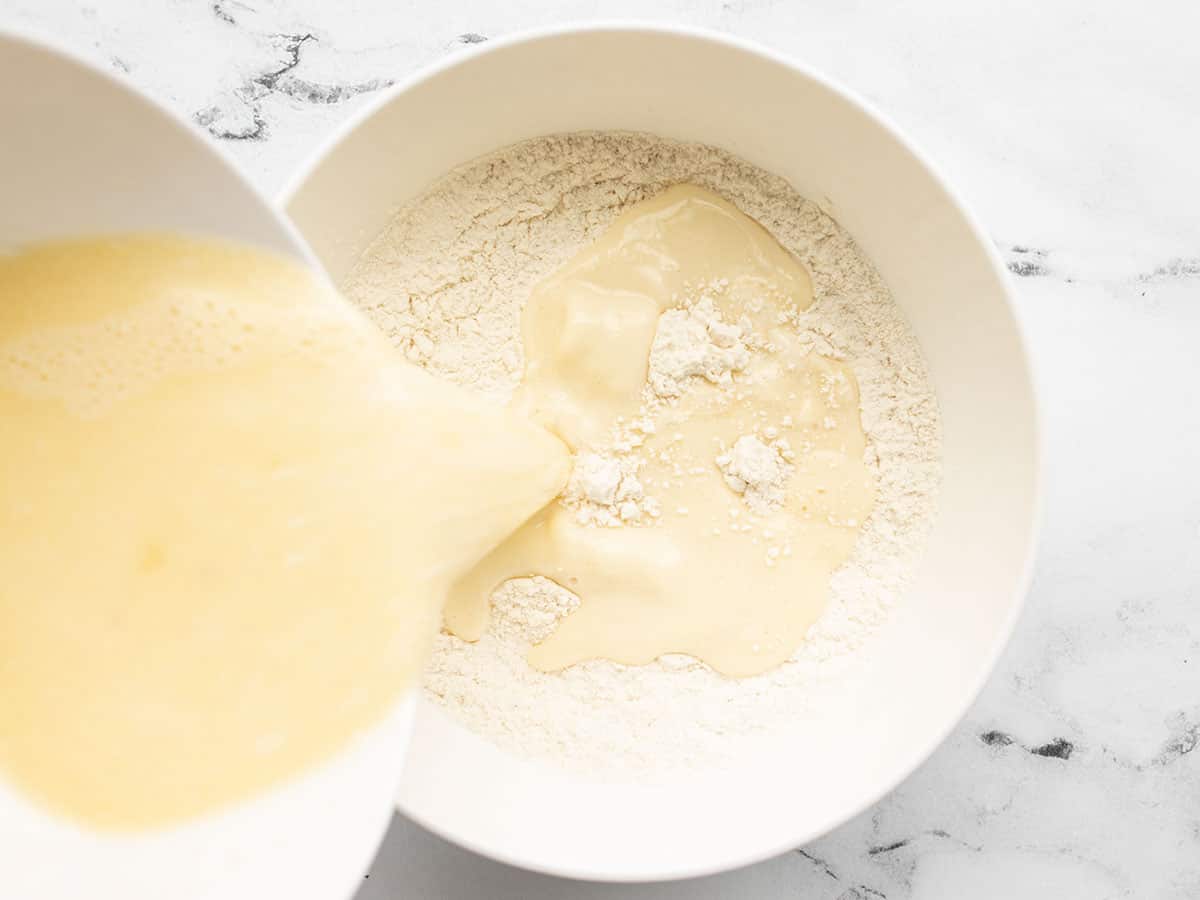 Wet being poured into dry ingredients.