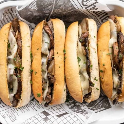 Close up overhead shot of Vegetarian French Dip Sandwiches in a tray.