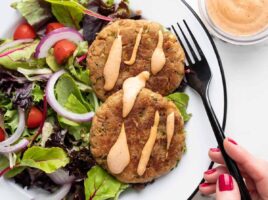 Two tuna cakes drizzled with comeback sauce.