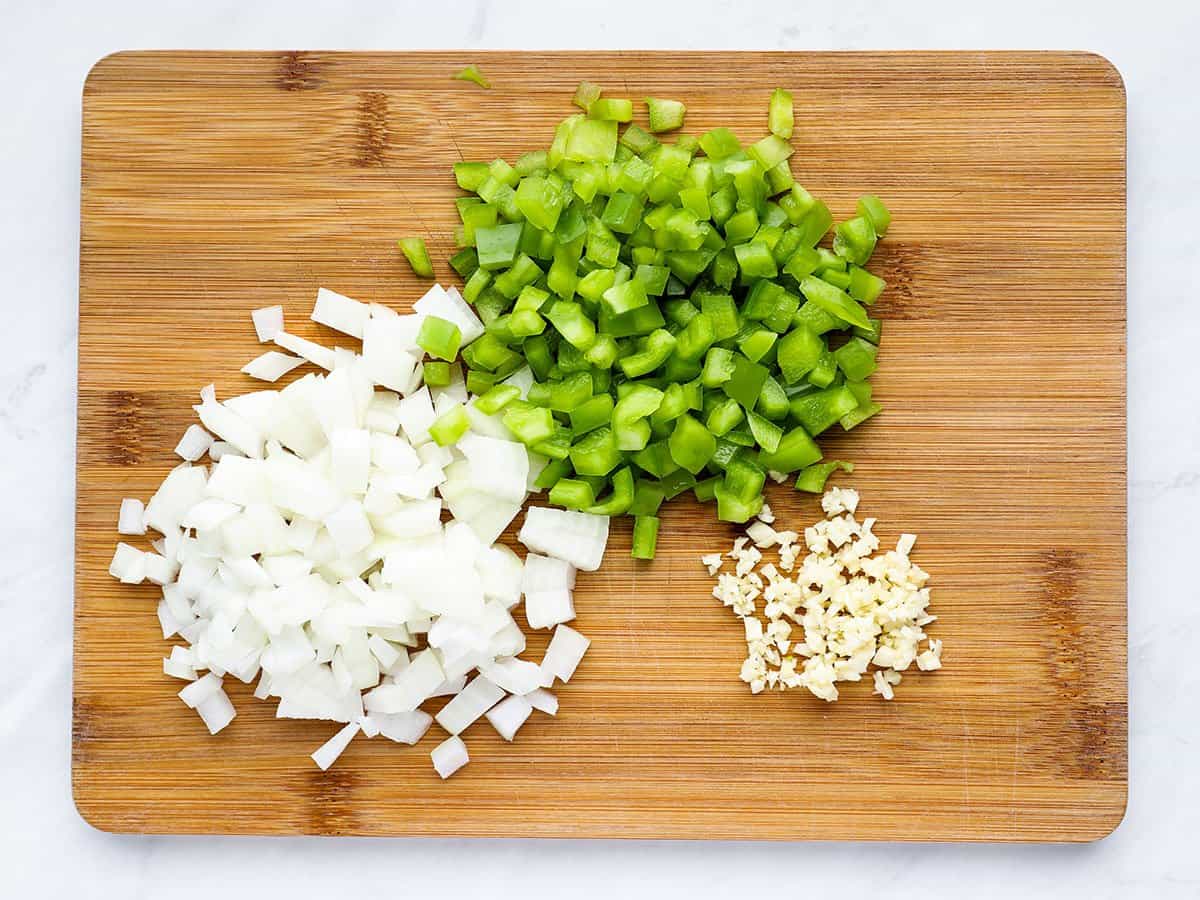 Chopped vegetables on a cutting board.